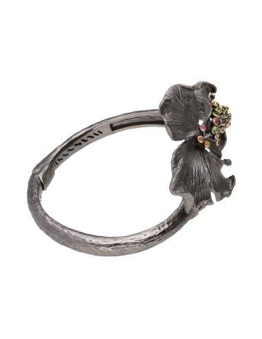 Flor da pulseira com gemas em...